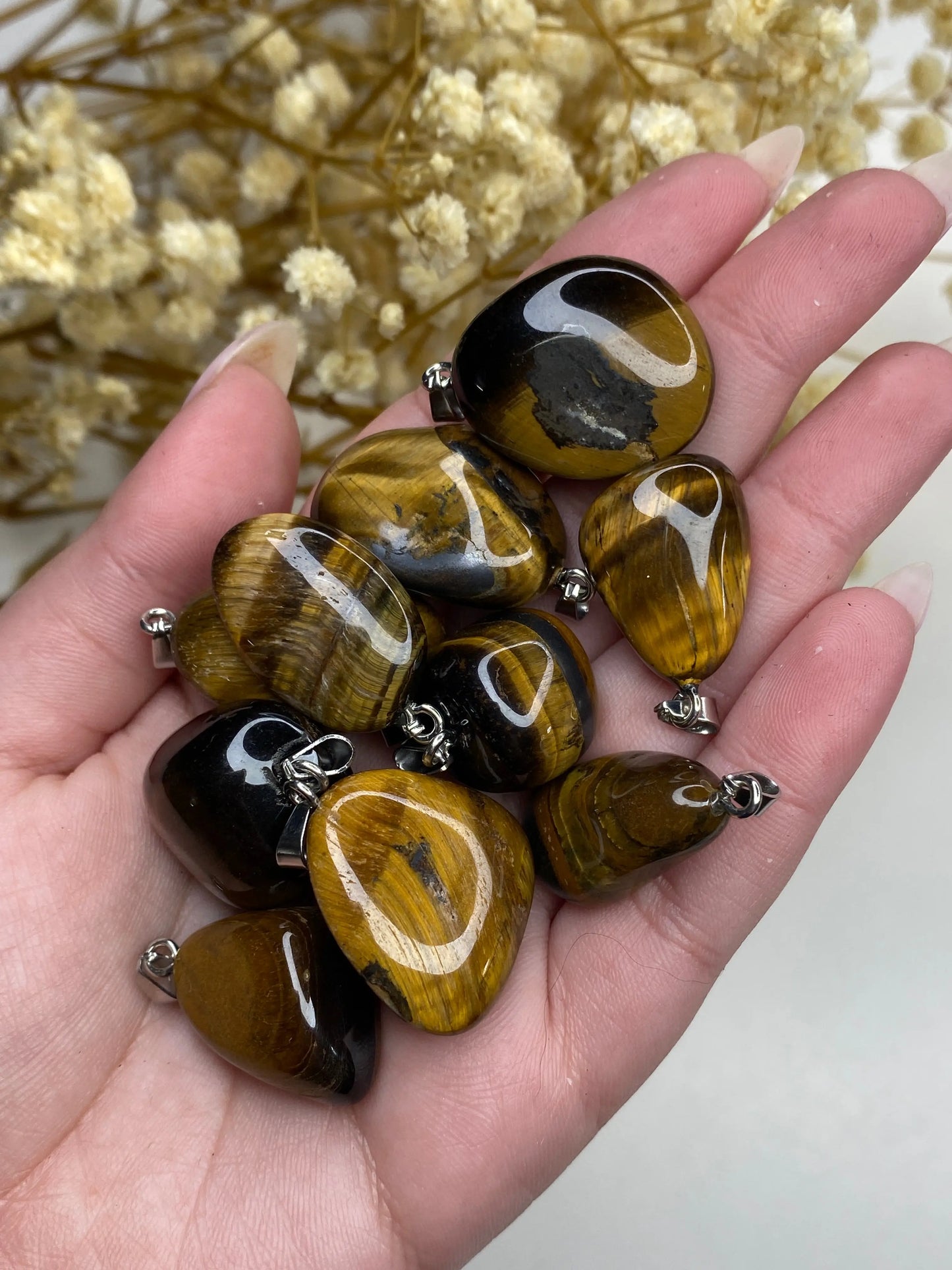 עין הנמר תליון | כח | בטחון | יציבות Phoenix Crystals - פניקס קריסטלים